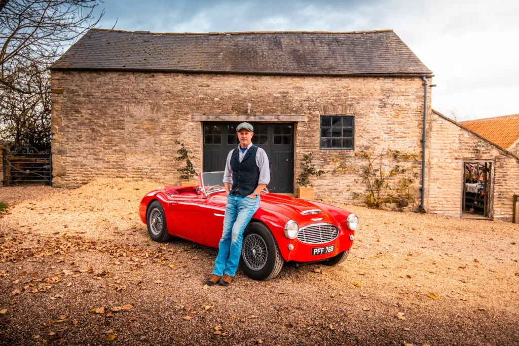 James next to his Healey near the Barn - aka The Vault